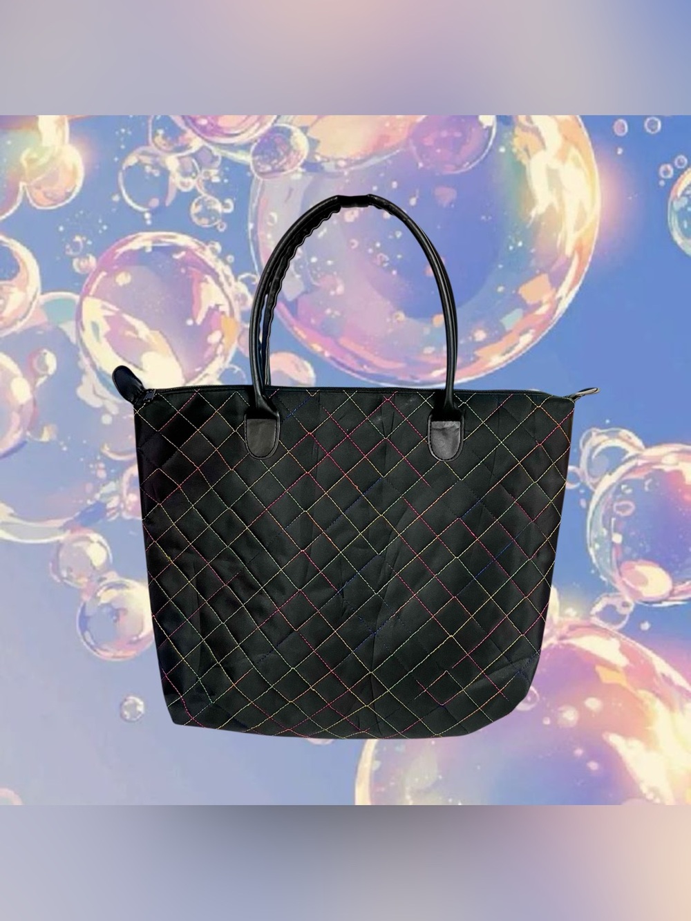 Signature Tote A black tote purse with rainbow stitches